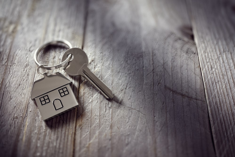 Image of a keychain with a house key