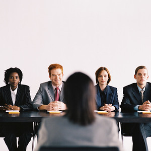 person sitting in interview