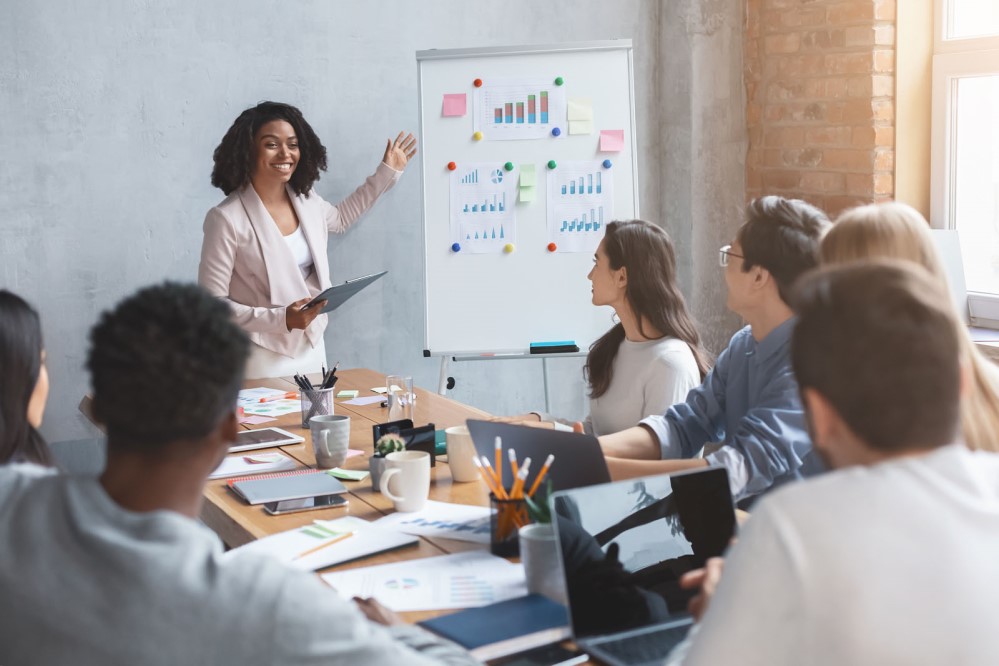 Image of ACAO and others around a conference table