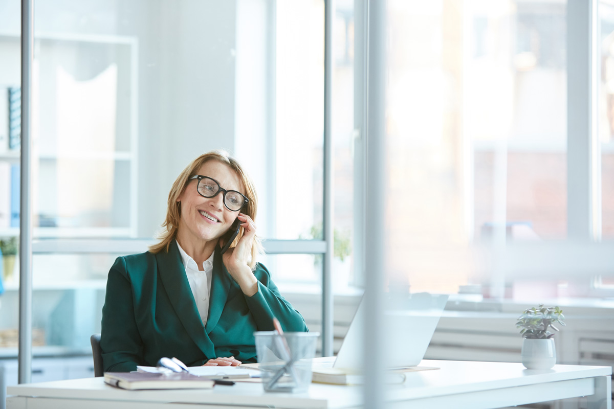 Photo of a woman on the phone