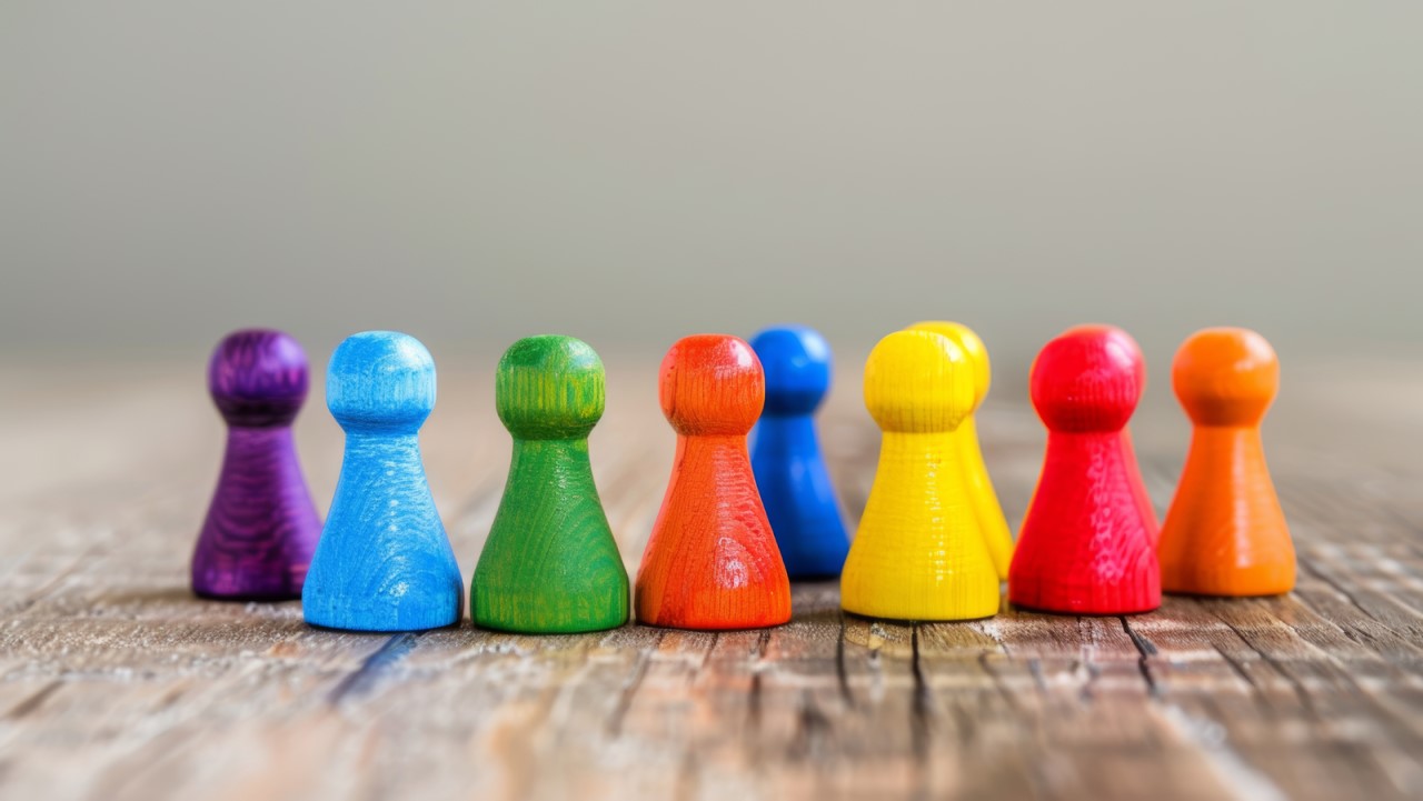 Image of wooden game pieces of various colors