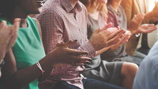 Image of people applauding