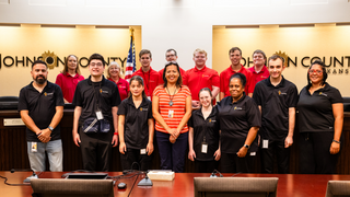 1)	Penny Postoak Ferguson pictured with a class from Johnson County Project SEARCH, an education and employment program for people with Intellectual and Developmental Disabilities 18 years of age or older who are interested in community employment.  