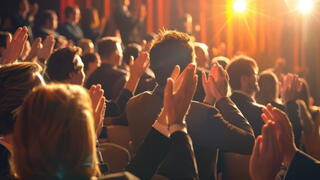 Image of people clapping